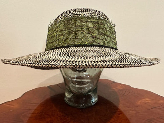 A two tone woven straw hat with green lacy overlay- simple but elegant ! Shade for the delicate!